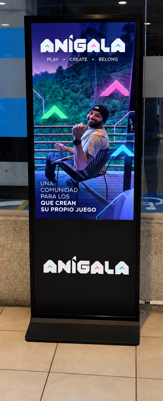 A black Anigala totem installed in a public interior, showing Anigala content.